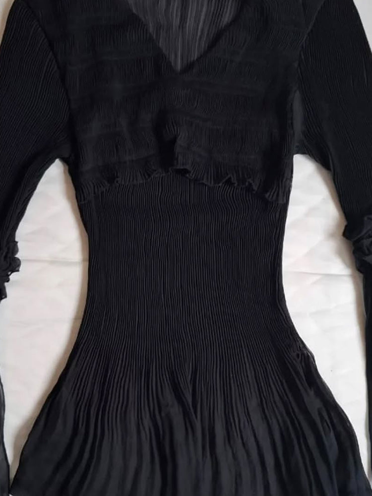 dark coquette long-sleeved mesh top
