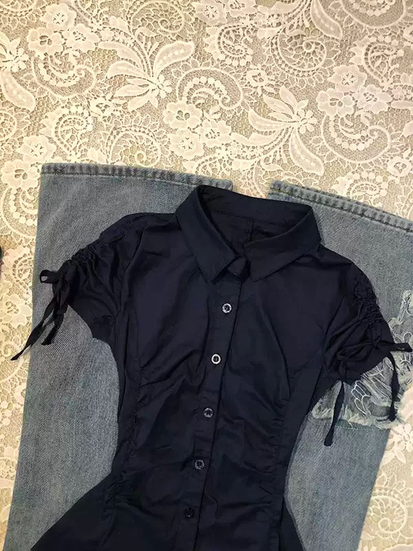 blue waisted short-sleeved shirt