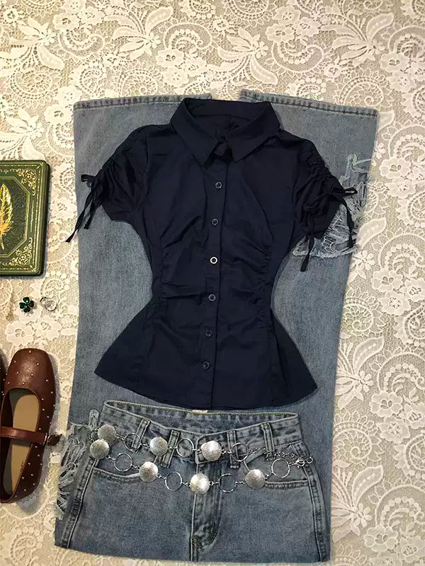 blue waisted short-sleeved shirt