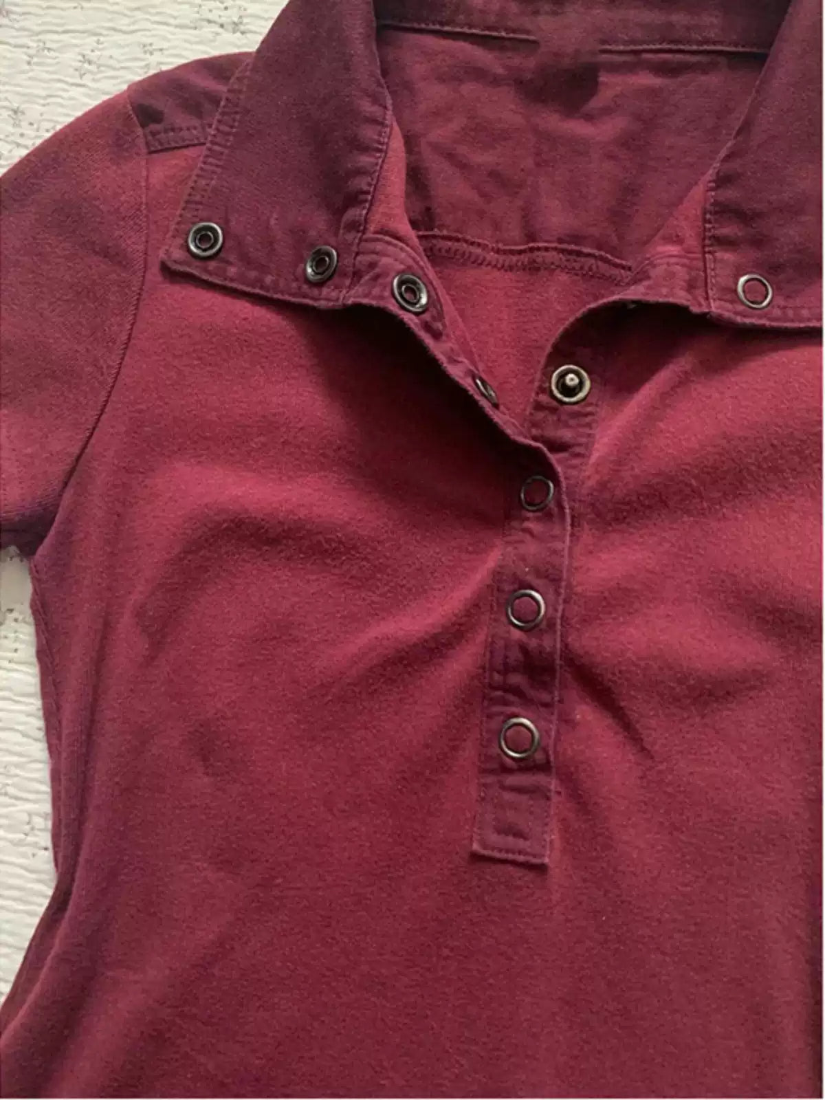 burgundy polo shirt