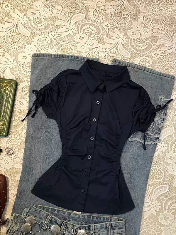 blue waisted short-sleeved shirt