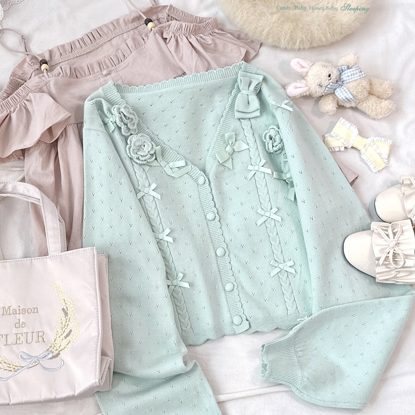 bow rose twist hollow knitted cardigan