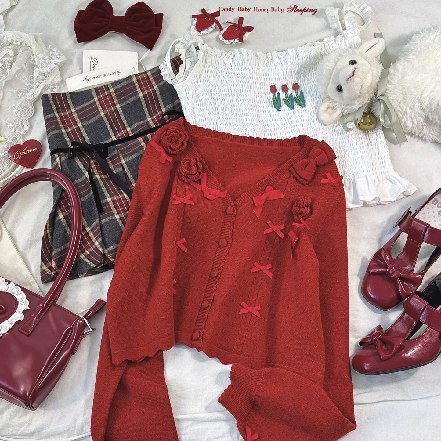 bow rose twist hollow knitted cardigan