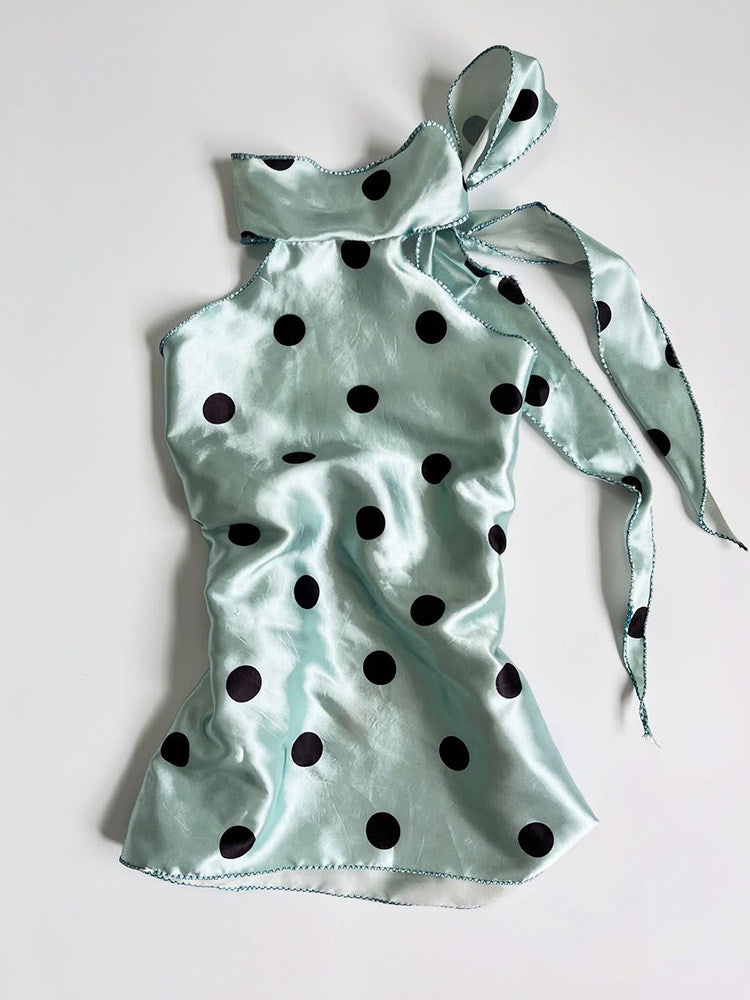 green polka dots top