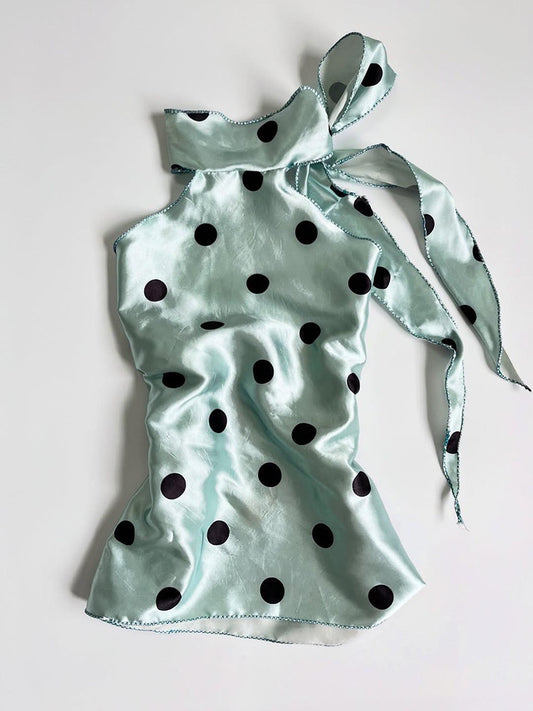 green polka dots top