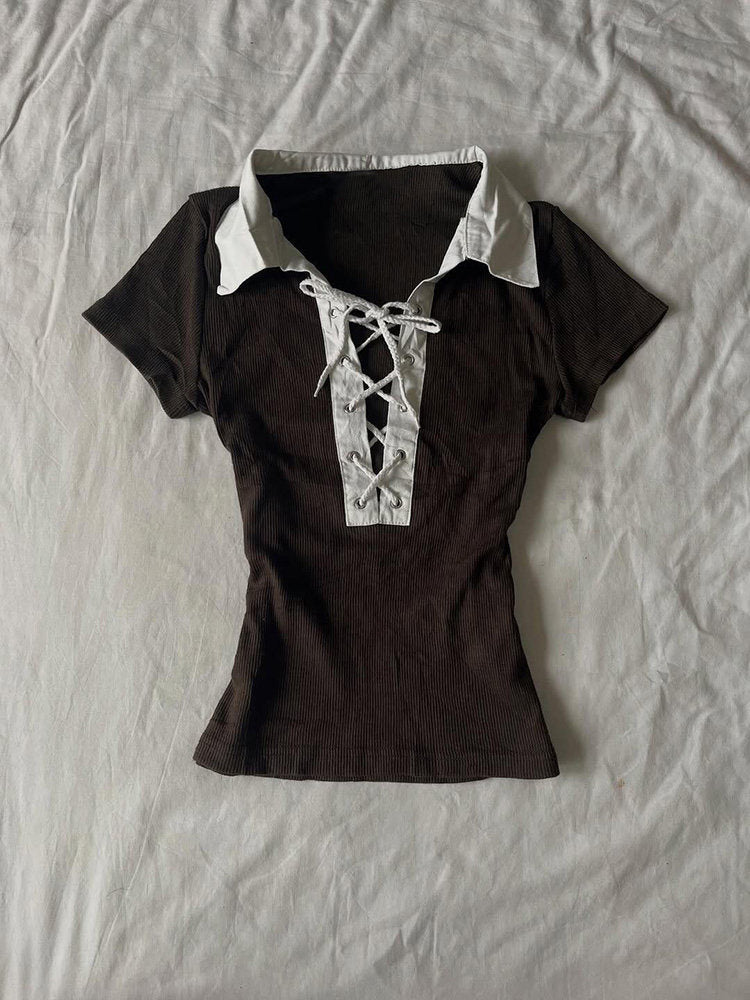 brown straps neck shirt