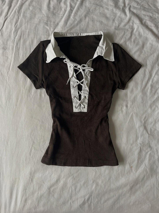 brown straps neck shirt