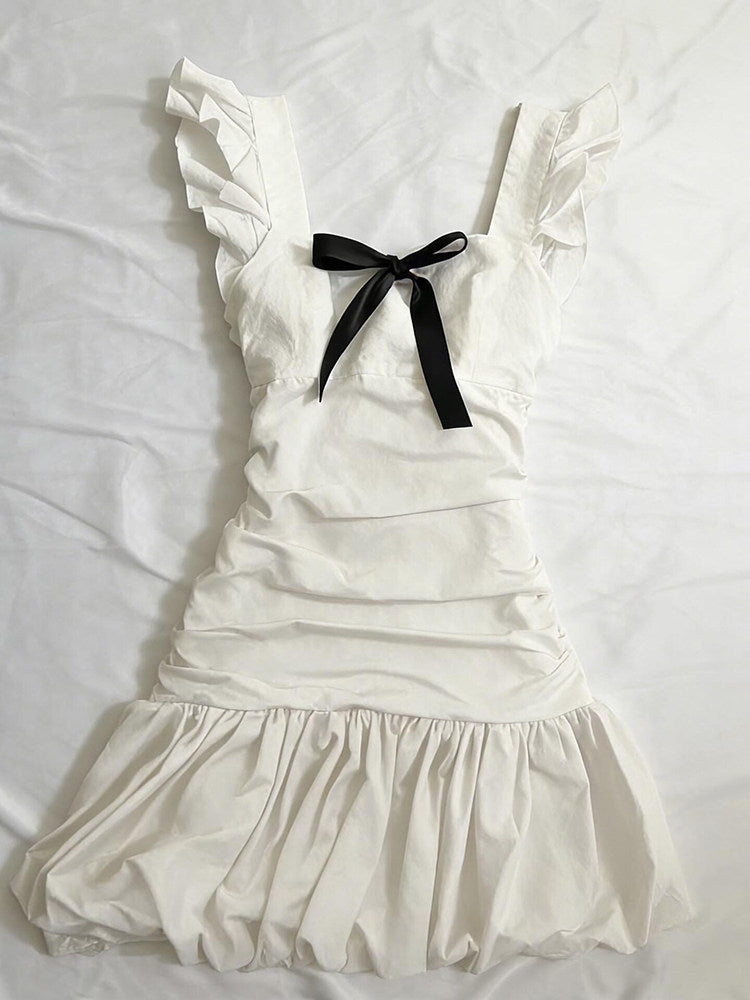 black bow suspender white dress