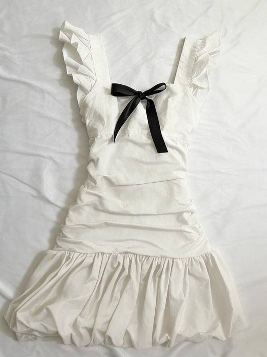 black bow suspender white dress