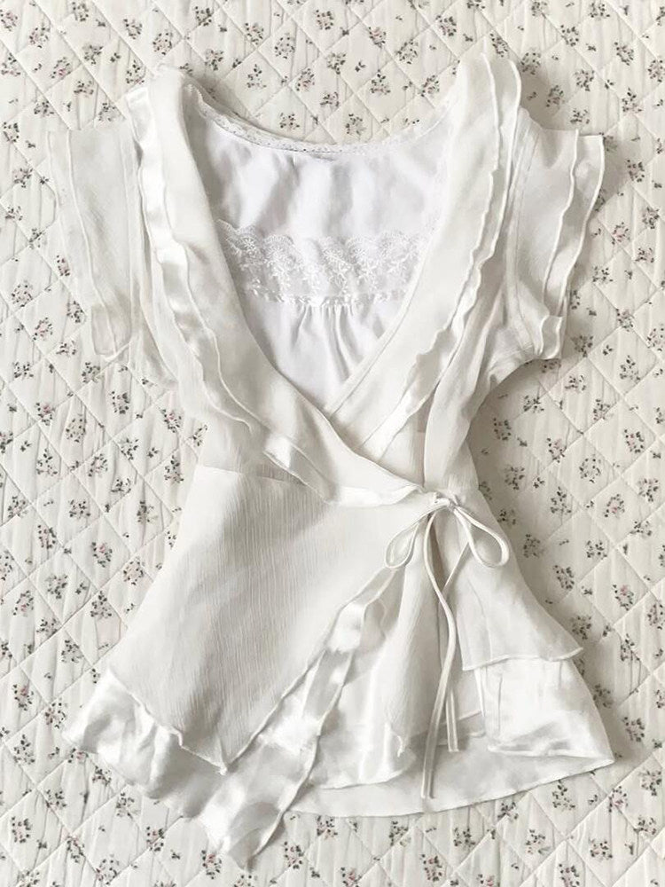 white ruffled v-neck shirt