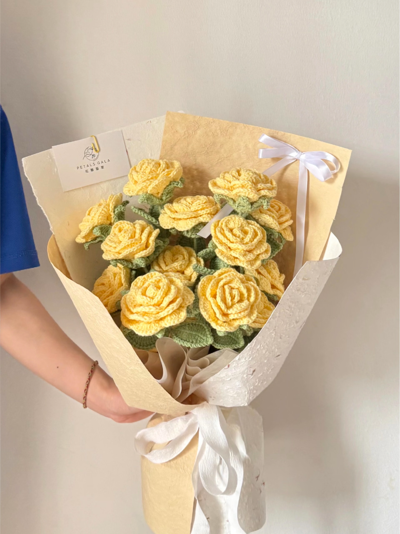 Handmade knitted wool rose bouquet