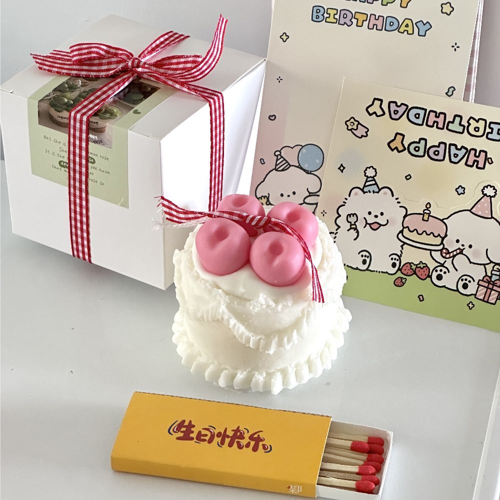 Decorated cake scented candle