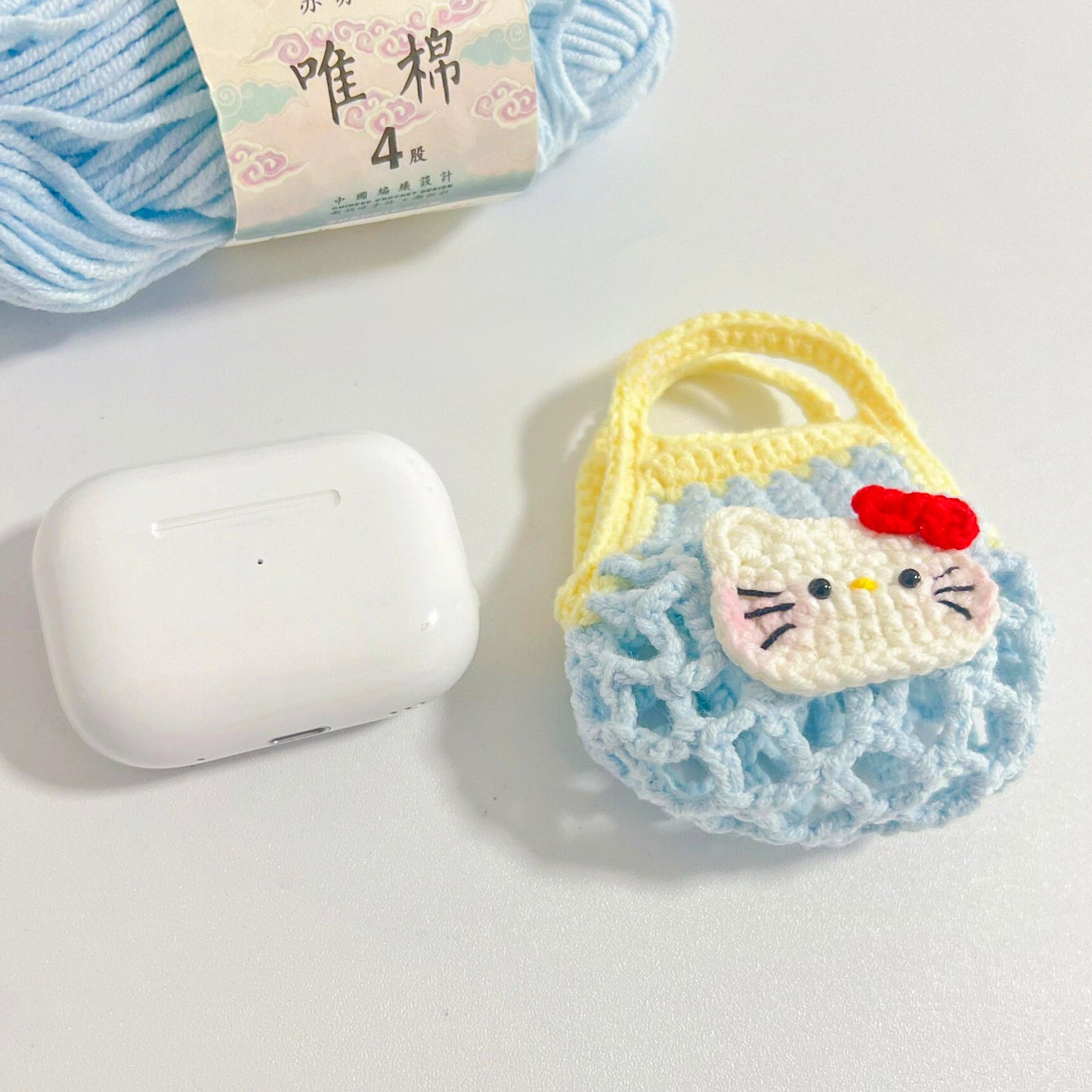 HelloKitty hollow net pocket diy wool headphone bag