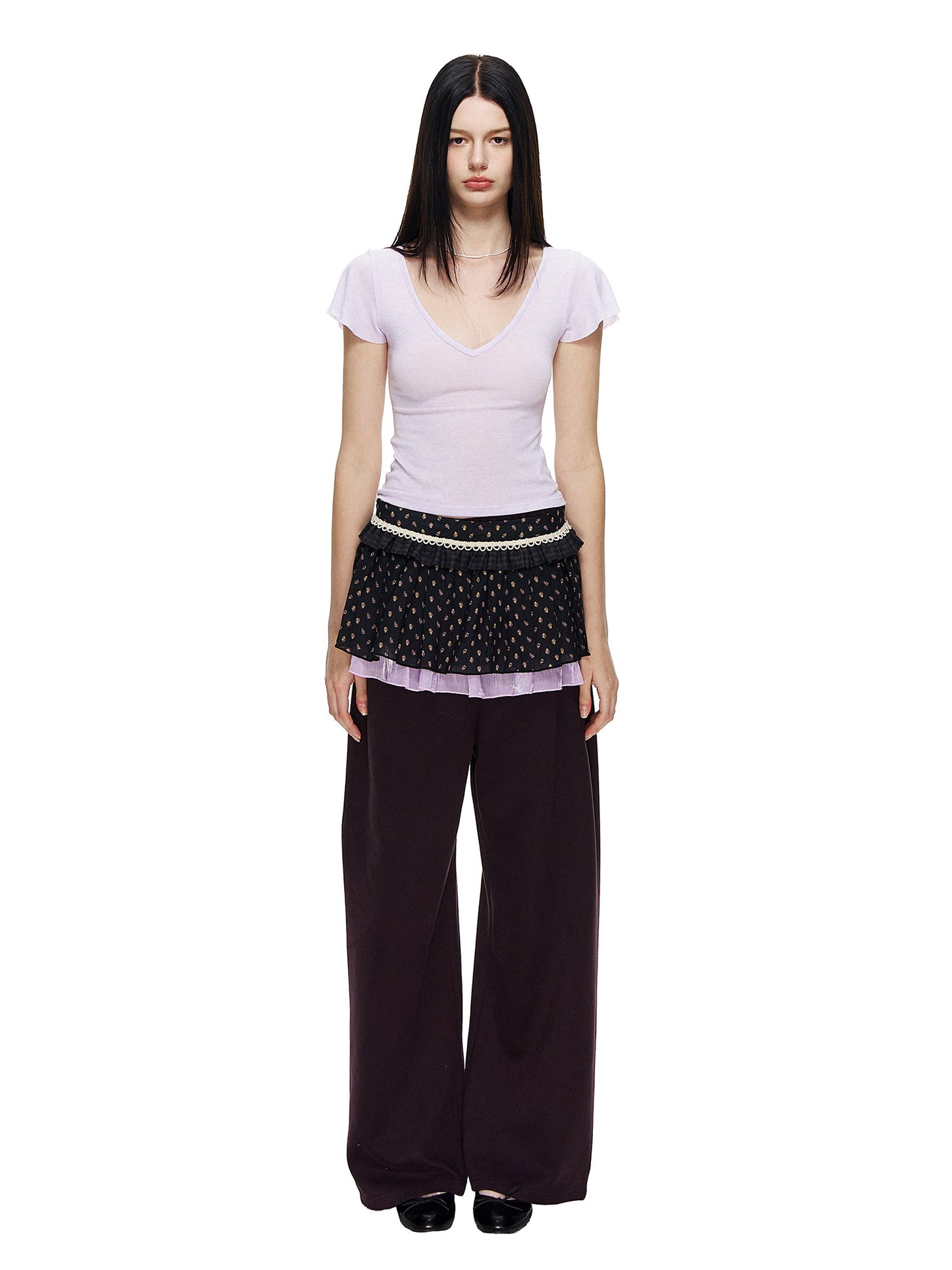 Pink-lined polka dot pleated A-line skirt