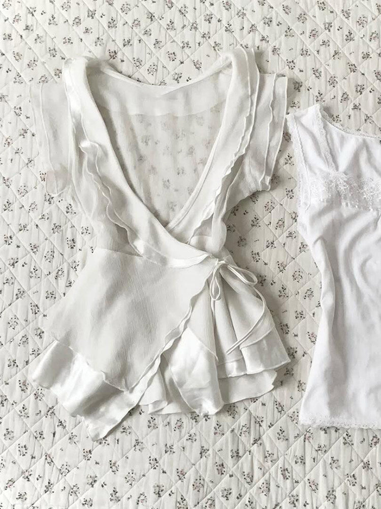 white ruffled v-neck shirt