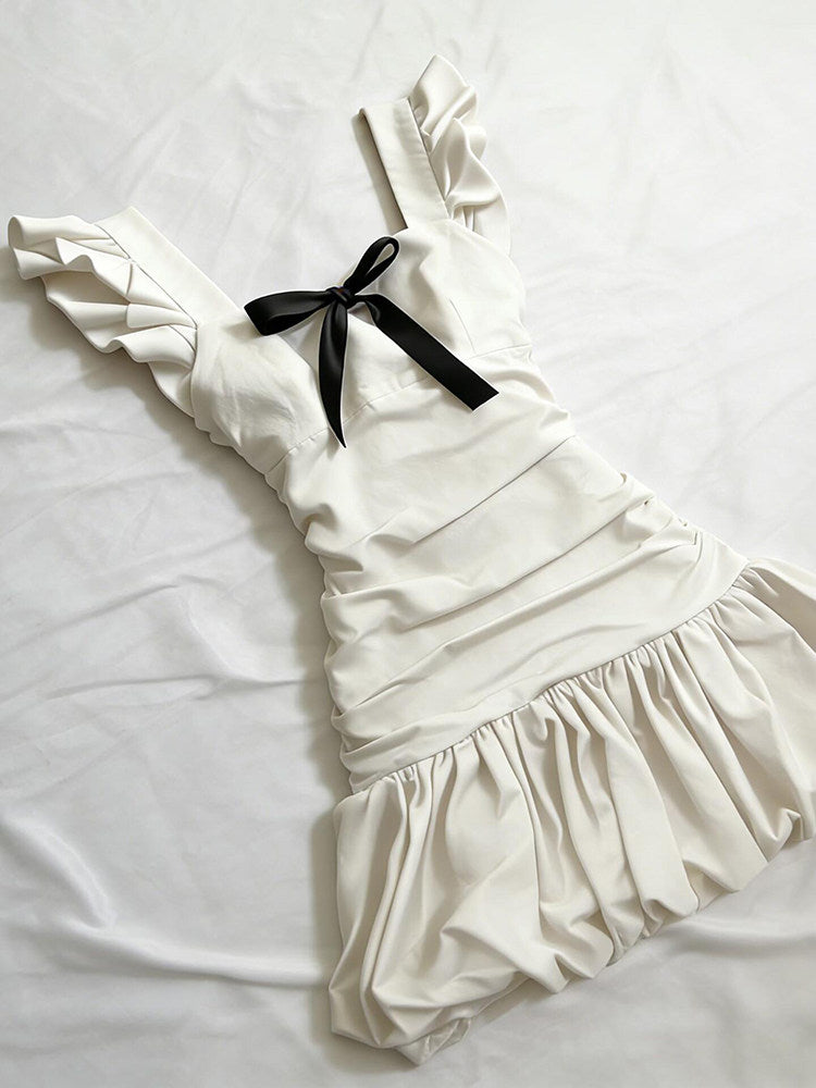 black bow suspender white dress