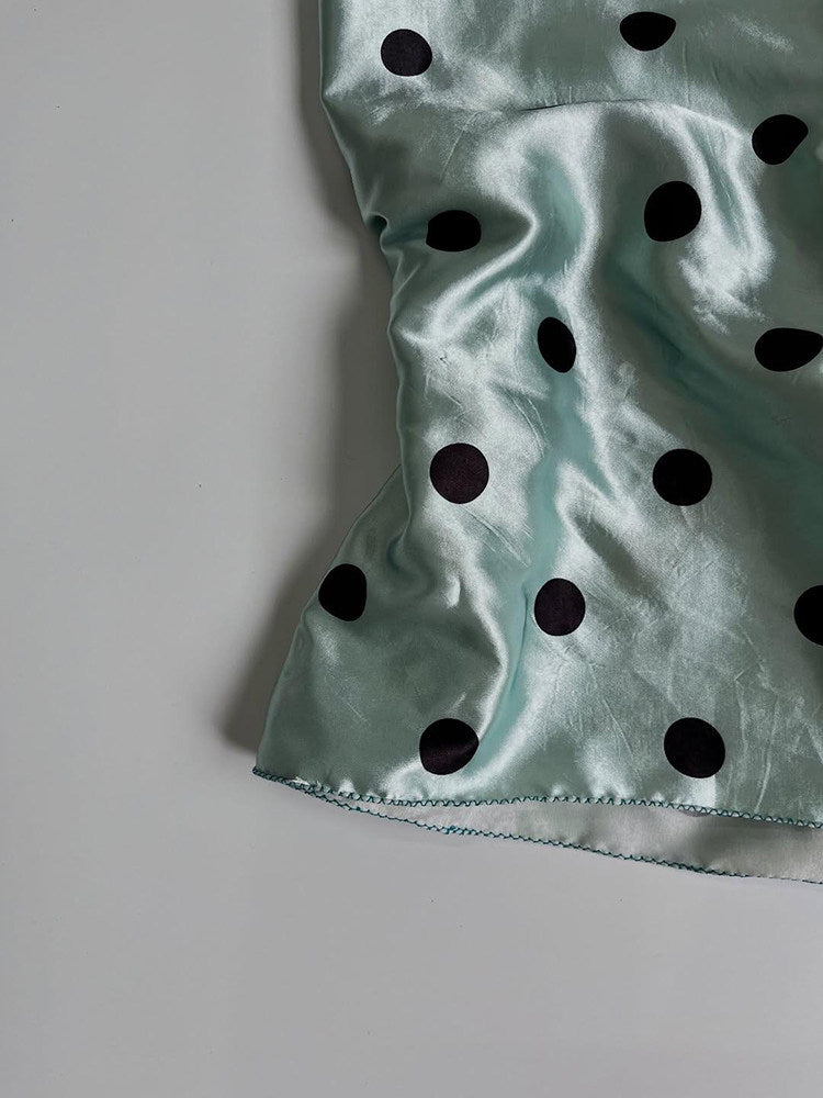 green polka dots top