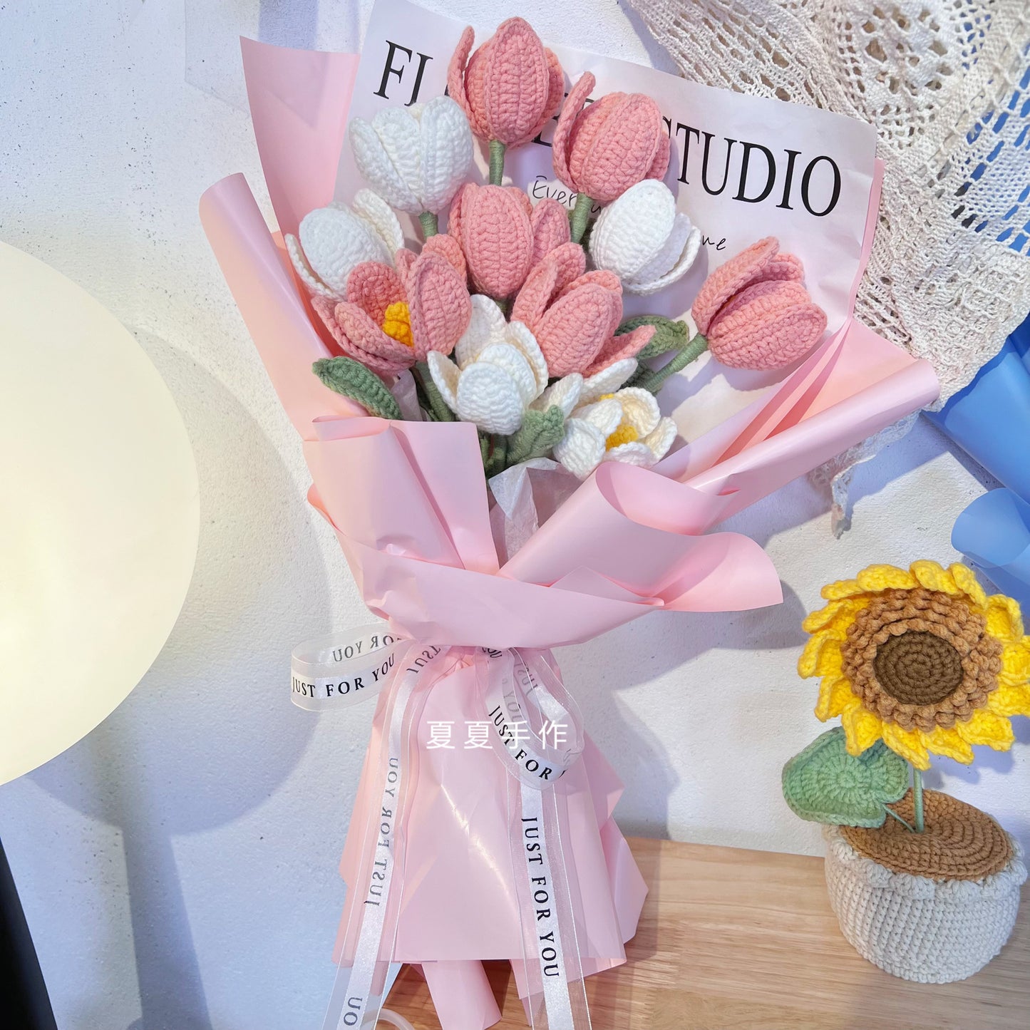 Finished hand-knitted wool tulip bouquet