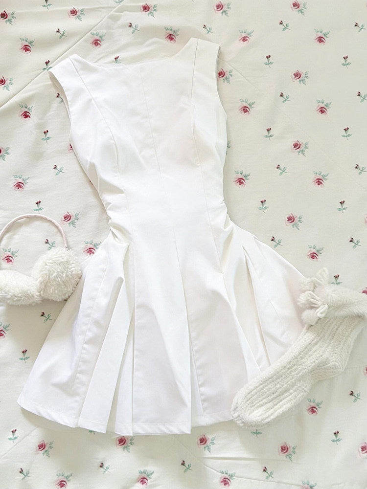 white sleeveless pleated dress