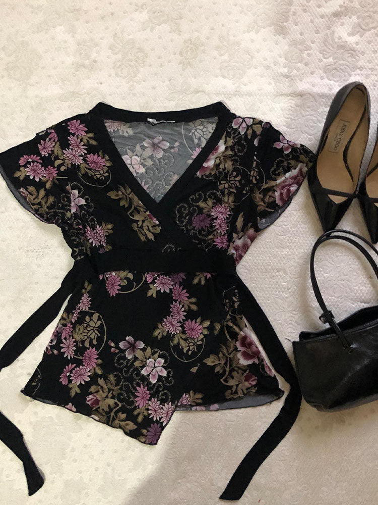 black floral v-neck shirt