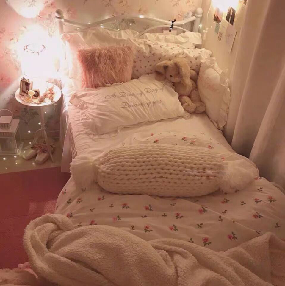 ruffled white embroidered cotton pillowcase