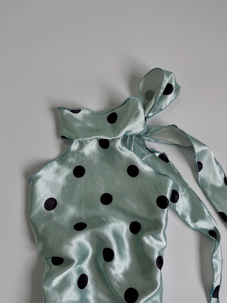 green polka dots top