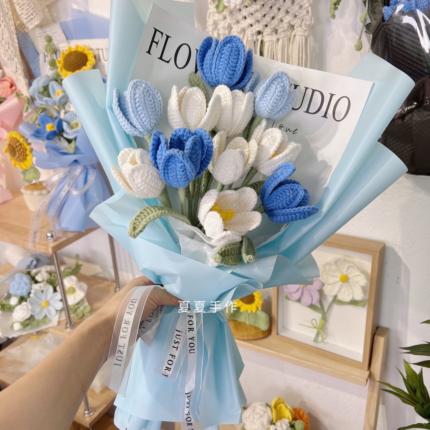 Finished hand-knitted wool tulip bouquet