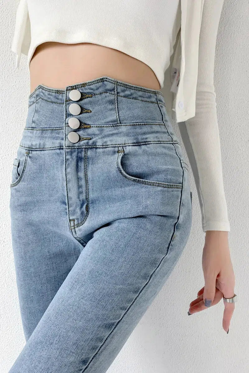 Cut Out Cross Waistband Skinny Jeans