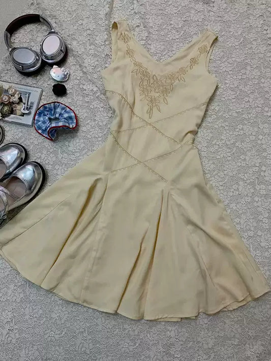 Yellow embroidered V-neck vest dress